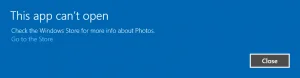 Windows 10 error dialog reading This app can't open, suggesting the Windows Store for more info about Photos