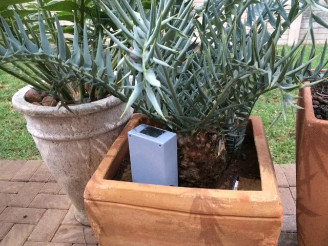 Weatherproof enclosure with soil moisture sensor